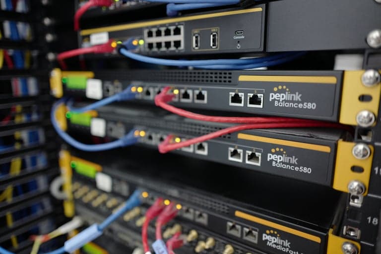 Peplink Balance 580 and MediaFast units mounted in a server rack