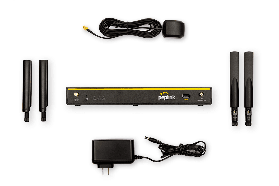 Balance 20X package contents: router, antennas, GPS antenna, and power supply